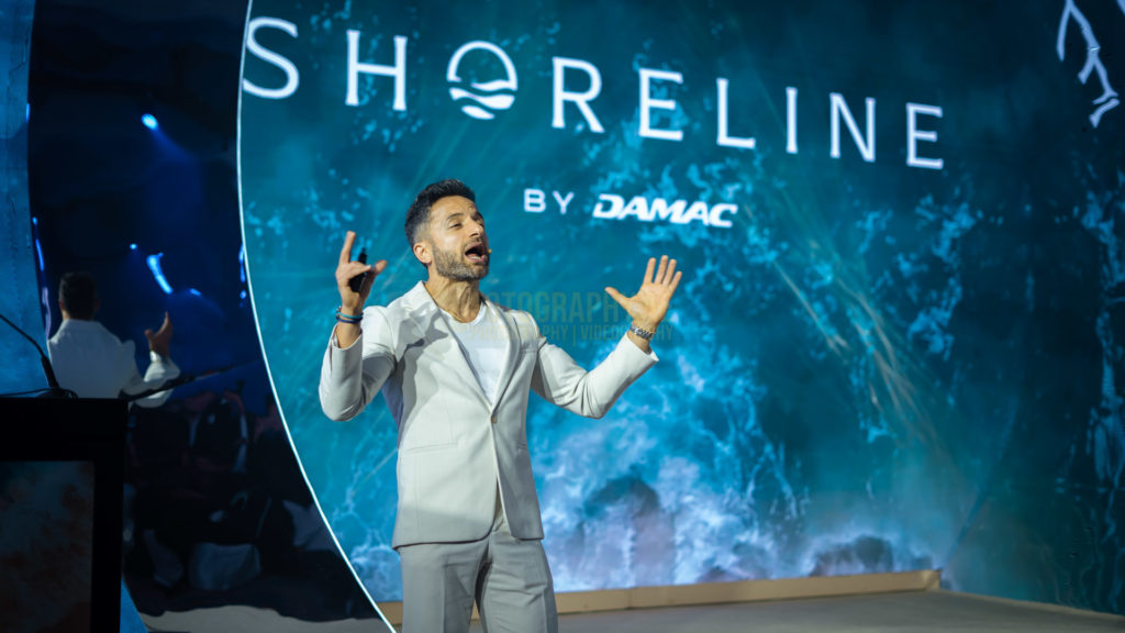 Professional Photograph of a speaker, delivering a presentation at a real estate awards ceremony in dubai